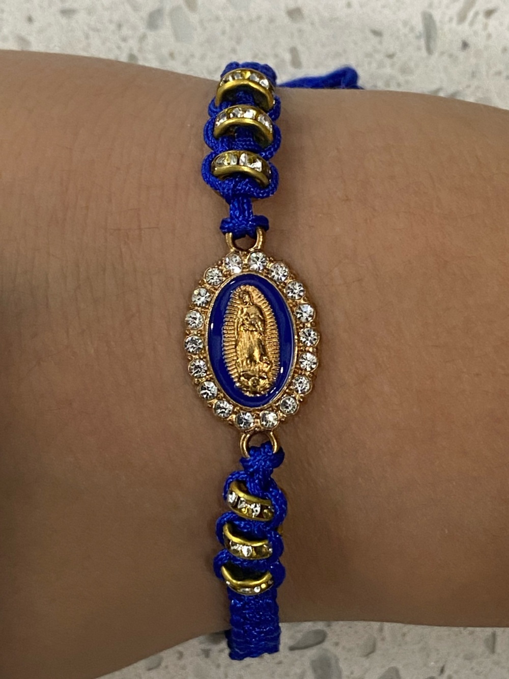 Gold-Tone Blue Cord Virgin Mary Bracelet with Crystal Accents